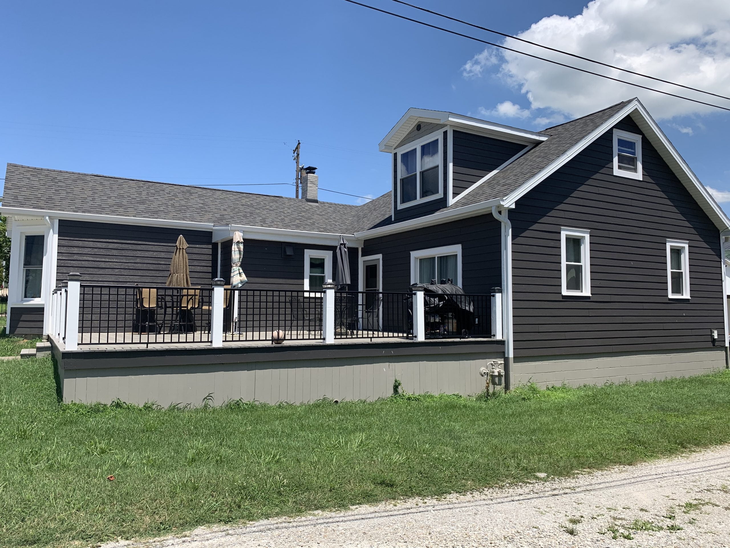 brown house with gray siding