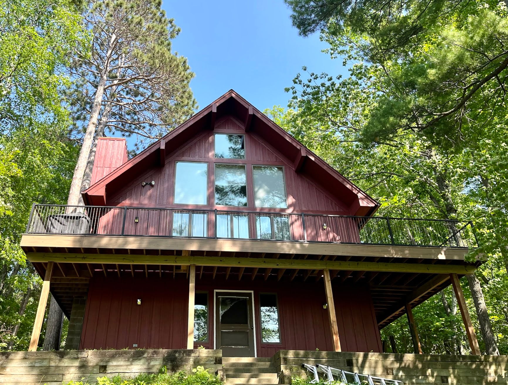 red siding color, board and batten, cabin style home